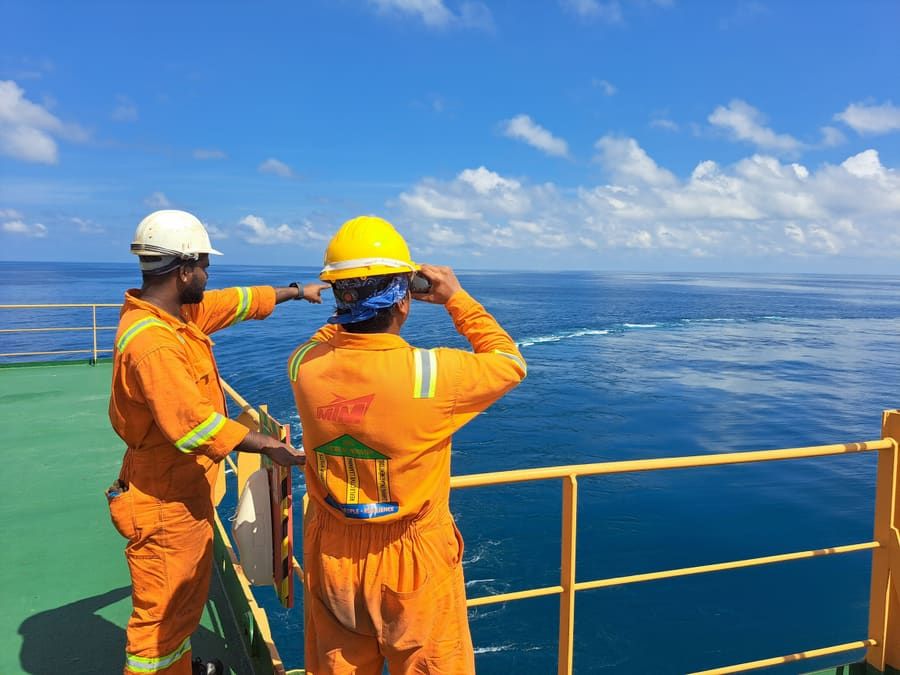 Marine crew on a vessel deck